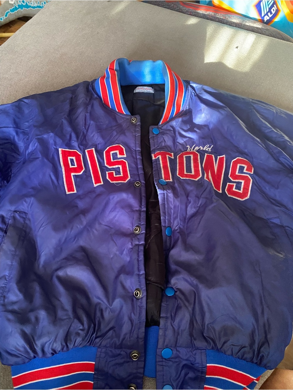 Detroit Pistons Blue Satin Puffer Jacket with Red Lettering